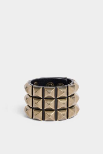 Bracciale con borchie su tutta la superficie