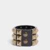 Bracciale con borchie su tutta la superficie Bracciale con borchie su tutta la superficie