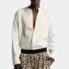 Camicia con papillon e linea morbida Camicia con papillon e linea morbida
