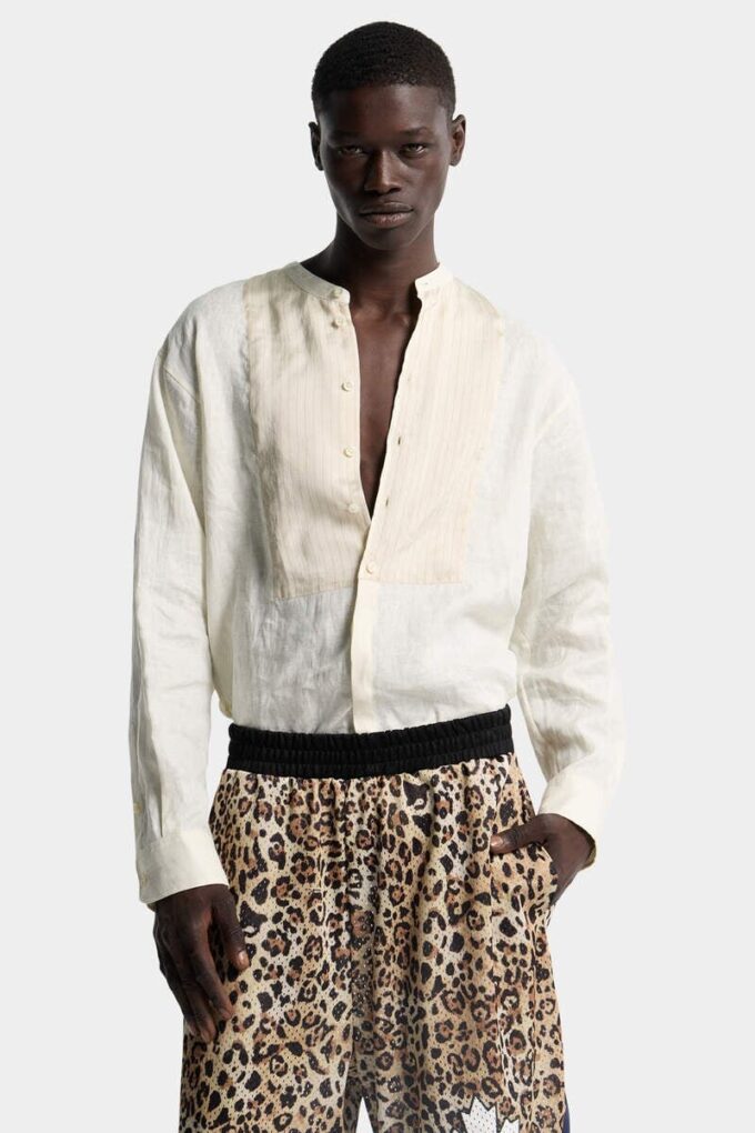 Camicia con papillon e linea morbida Camicia con papillon e linea morbida