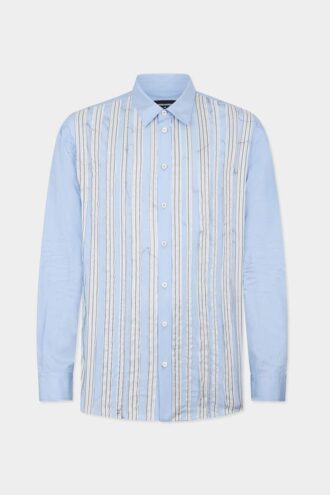 Camicia con spalle scese e taglio grezzo