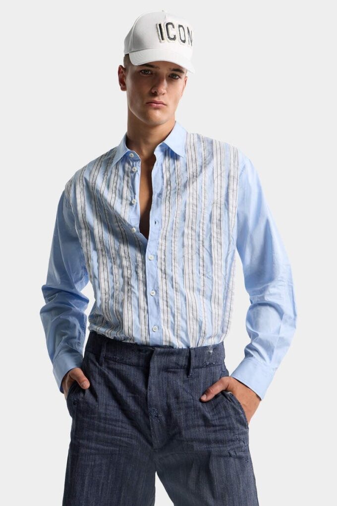 Camicia con spalle scese e taglio grezzo Camicia con spalle scese e taglio grezzo