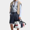 Camicia con spalle scese e taglio grezzo Camicia con spalle scese e taglio grezzo