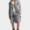 Cappotto con cappuccio strappato Cappotto con cappuccio strappato