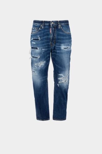 Jeans blu strappati con lavaggio medio