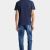 Jeans blu strappati con lavaggio medio