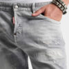 Jeans slim twist con lavaggio grigio spazzolato Jeans slim twist con lavaggio grigio spazzolato