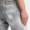 Jeans slim twist con lavaggio grigio spazzolato Jeans slim twist con lavaggio grigio spazzolato