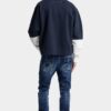 Jeans Teddy con lavaggio a macchie rosse medie Jeans Teddy con lavaggio a macchie rosse medie