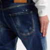 Jeans Teddy con lavaggio a macchie rosse medie Jeans Teddy con lavaggio a macchie rosse medie