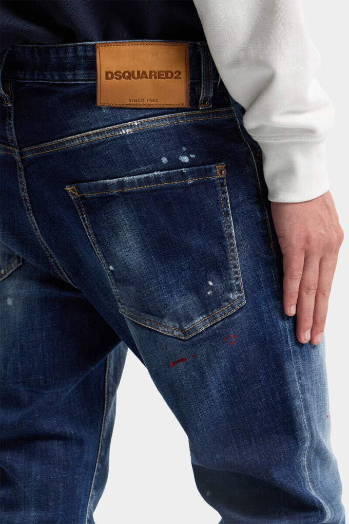 Jeans Teddy con lavaggio a macchie rosse medie Jeans Teddy con lavaggio a macchie rosse medie