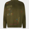Maglione con scollo a V e scarabocchi fatti a mano Maglione con scollo a V e scarabocchi fatti a mano