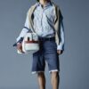 Camicia con spalle scese e taglio grezzo Camicia con spalle scese e taglio grezzo