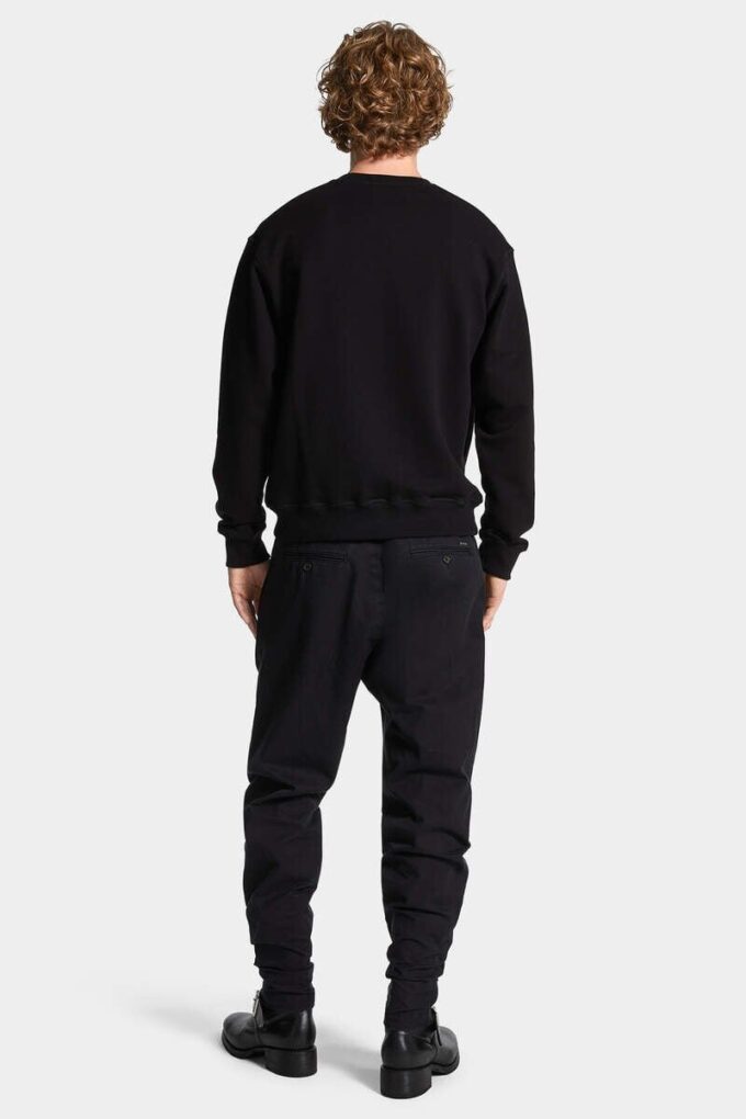 Pantaloni in cotone con una piega Pantaloni in cotone con una piega