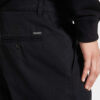 Pantaloni in cotone con una piega Pantaloni in cotone con una piega