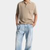 Pantaloni in denim con lavaggio chiaro e una piega Pantaloni in denim con lavaggio chiaro e una piega